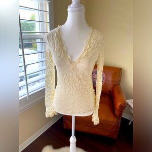 Cream lace shirt. Elegant and chic. See through back. Perfect for going out!